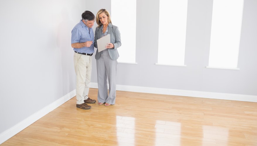 Property manager going over rent inventory checklist with the property landlord.