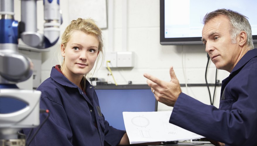 Photo Credit: monkeybusinessimages/iStock/Getty Images Relative explaining work to teenage niece.