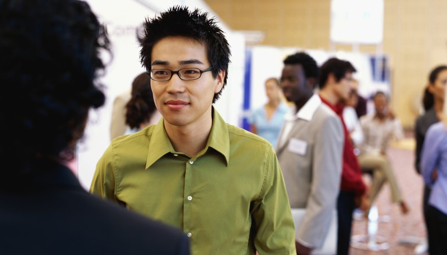 two businessmen discussing at an exhibition