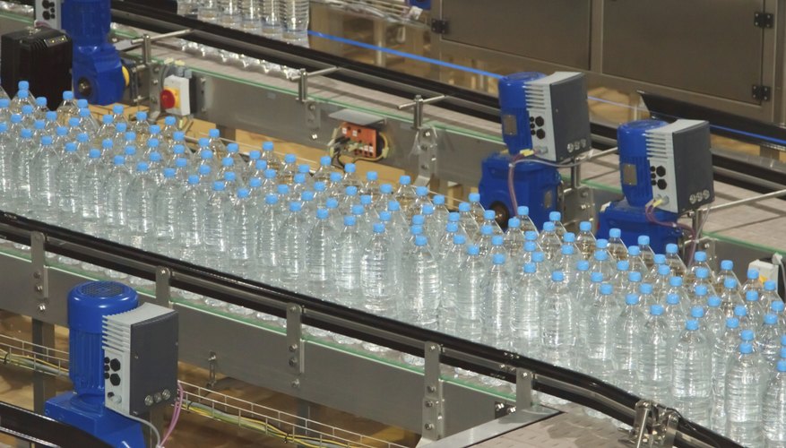 Plastic water bottles on conveyor