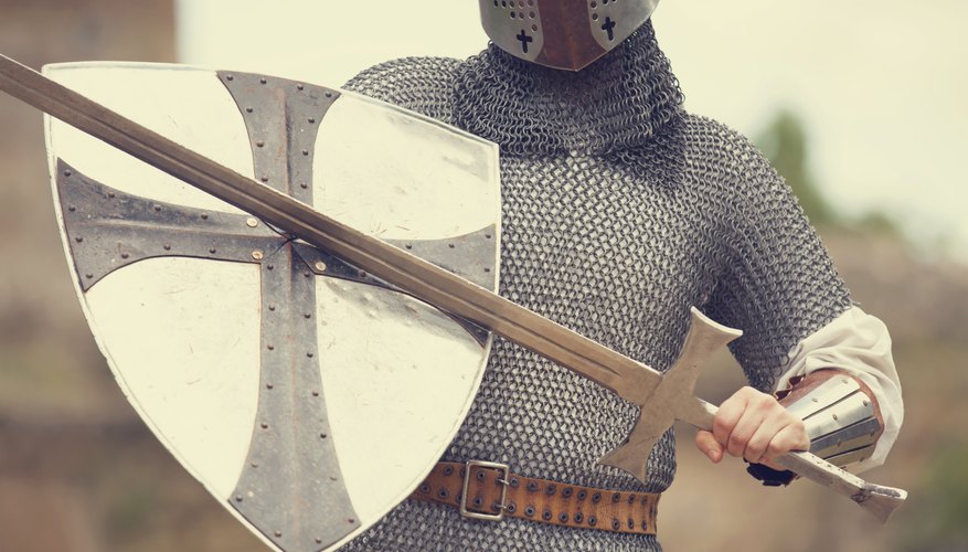 Costume with chainmail, shield, and sword. Costume with chainmail, shield, and sword.