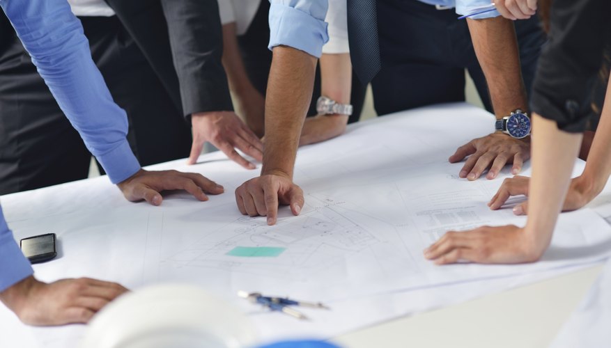 business people and engineers on meeting