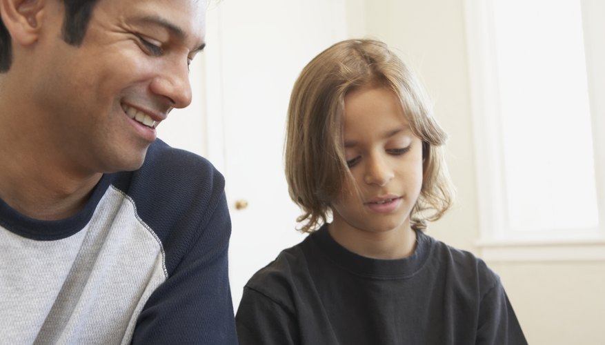 Father speaking with child. Father speaking with child.