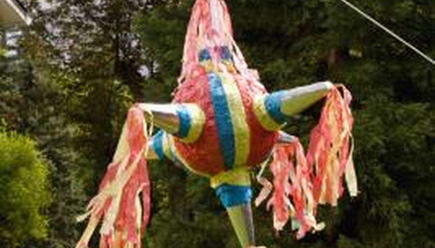 Photo Credit: Todd Warnock/Lifesize/Getty Images Use paper mache to make beautiful pinatas for birthday parties.