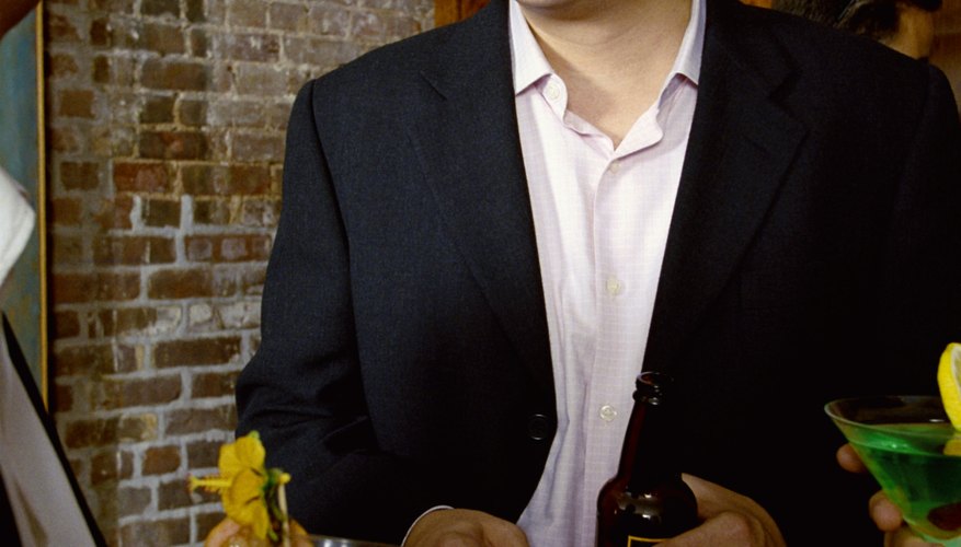 Photo Credit: Creatas/Creatas/Getty Images Attend as many business and professional networking functions as you can at the start of your career.