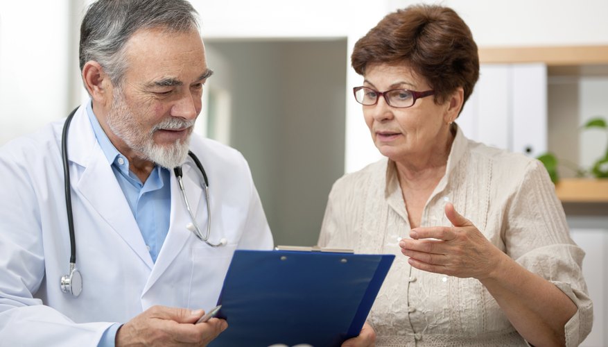 doctor speaking with patient doctor speaking with patient