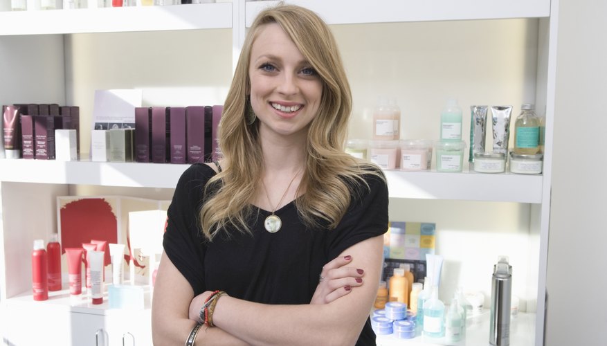 Photo Credit: moodboard/moodboard/Getty Images Woman standing in front of assortment of salon products