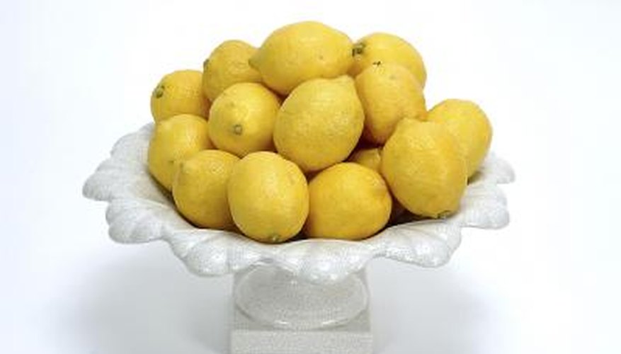 Photo Credit: Photos.com/AbleStock.com/Getty Images Use nails as electrodes and make your own lemon battery.