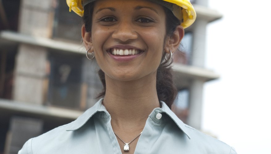 Woman holding plans