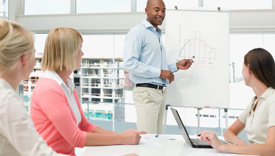 Businessman holding presentation for colleagues
