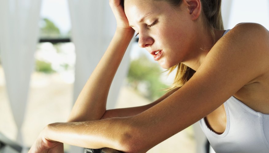 Tired woman exercising Tired woman exercising