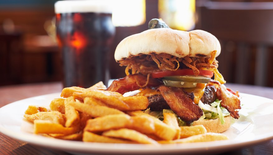 A burger with french fries. A burger with french fries.