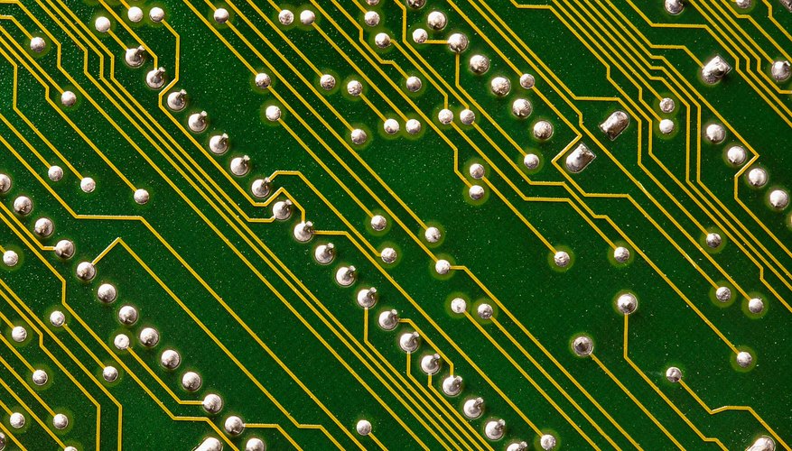 Photo Credit: Jupiterimages/Photos.com/Getty Images The gold from circuit boards and other electronic waste can be extracted and recycled.