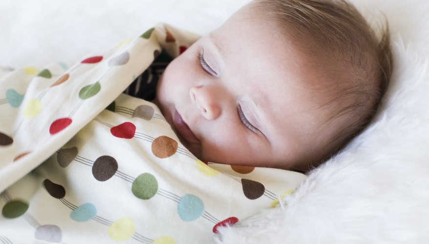 Swaddling keeps the blanket around your baby when she sleeps. Swaddling keeps the blanket around your baby when she sleeps.