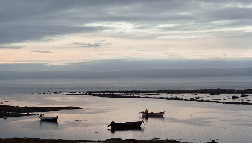 Boats in cove at dawn