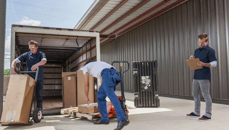 Dock Workers Loading A Delivery Truck