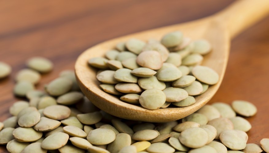A close-up of green lentils. A close-up of green lentils.
