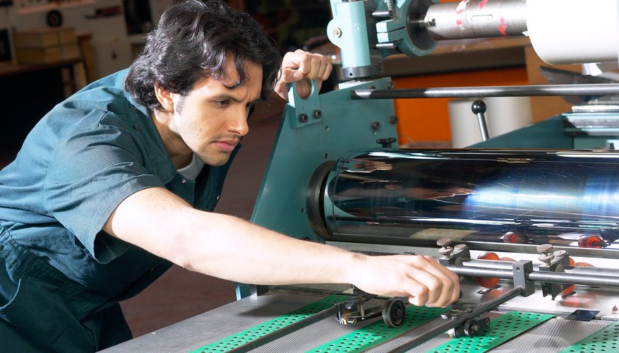 Man using machine in factory