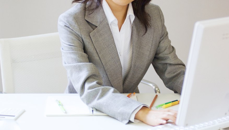 Businesswoman working at her desk