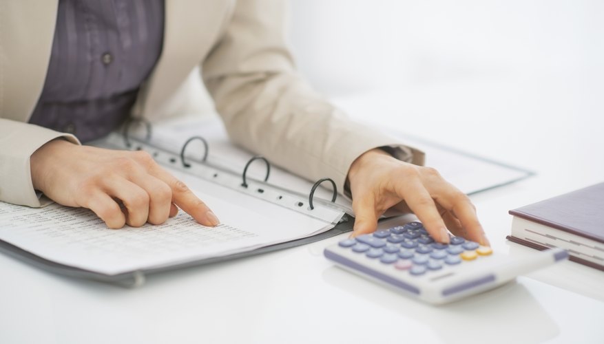 closeup on business woman working with documents