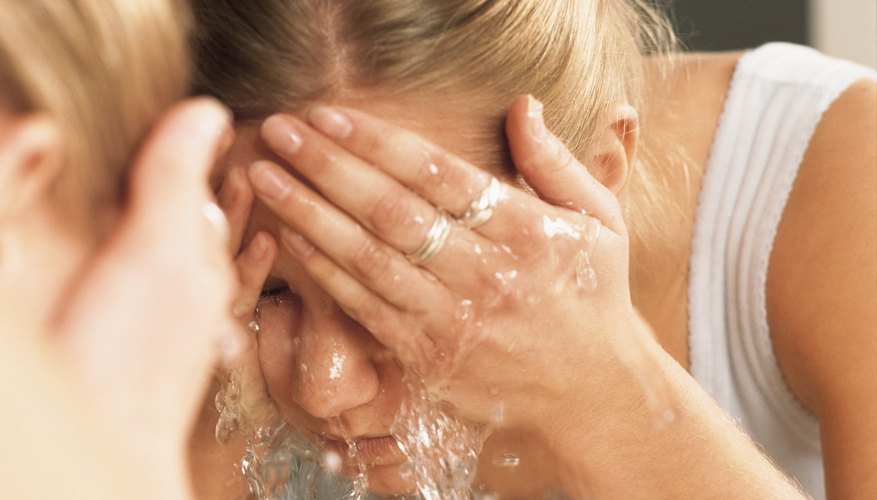 Rinsing eyes with warm water Rinsing eyes with warm water