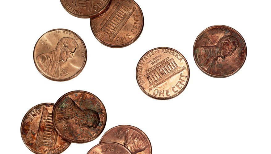 Photo Credit: Brand X Pictures/Brand X Pictures/Getty Images With time, some pennies start to discolor.