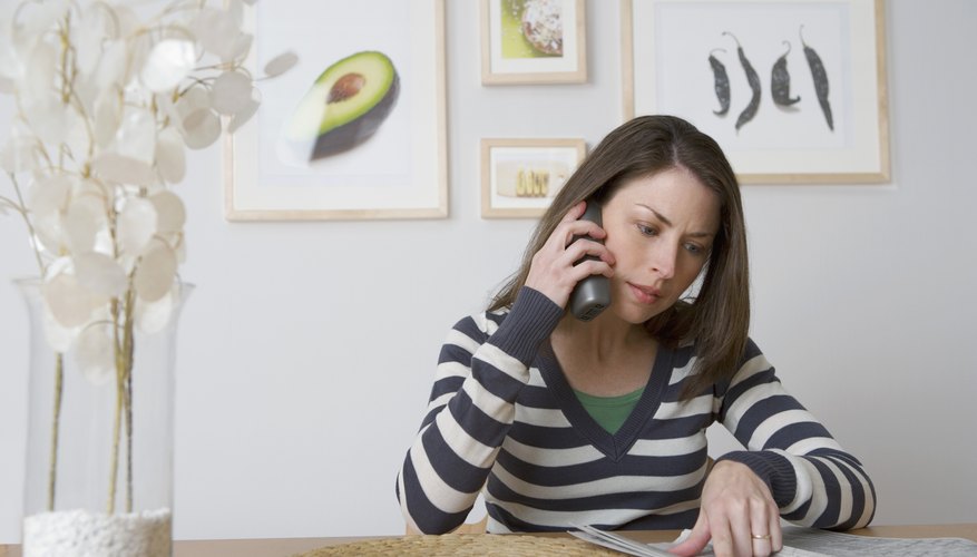 Photo Credit: Jupiterimages/Stockbyte/Getty Images Concerned customer on phone.