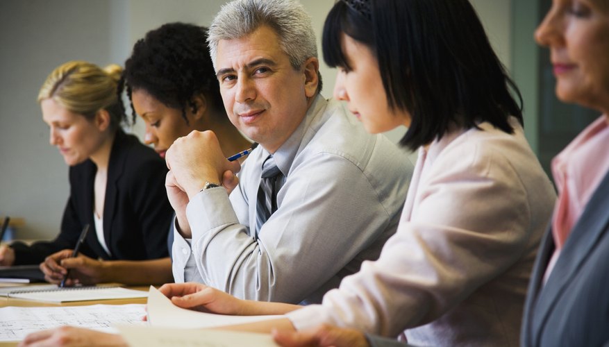 Multi-ethnic businesspeople at meeting