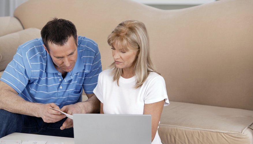 Couple looking at bills