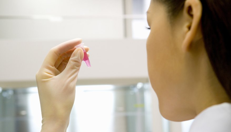 Photo Credit: DAJ/amana images/Getty Images A chemical engineer analyzes a liquid in a small tube.