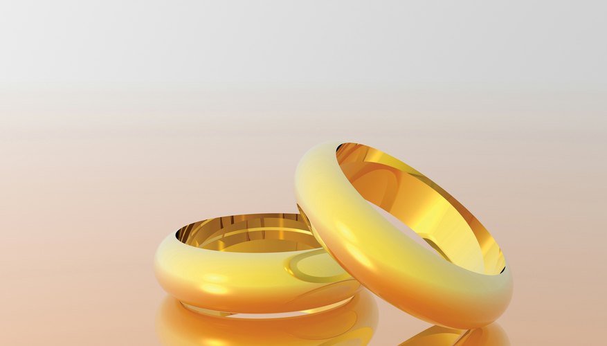 Photo Credit: Jupiterimages/Photos.com/Getty Images 18-carat gold is commonly used in wedding rings.