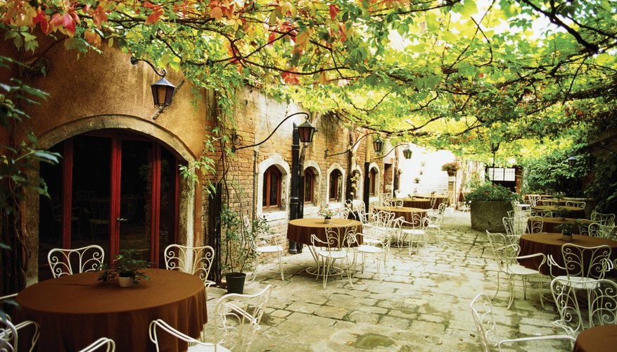 Photo Credit: Medioimages/Photodisc/Photodisc/Getty Images If you're decorating an upscale establishment, the cost will run into the tens of thousands.