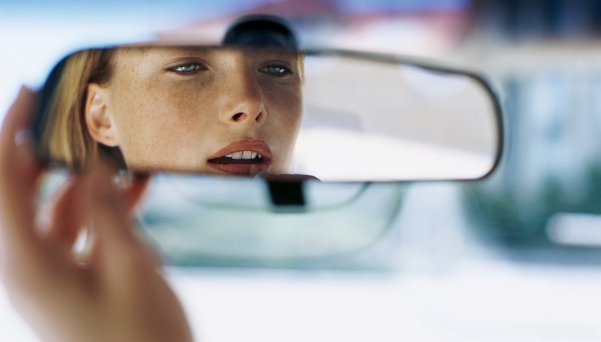 Woman looking in mirror Woman looking in mirror