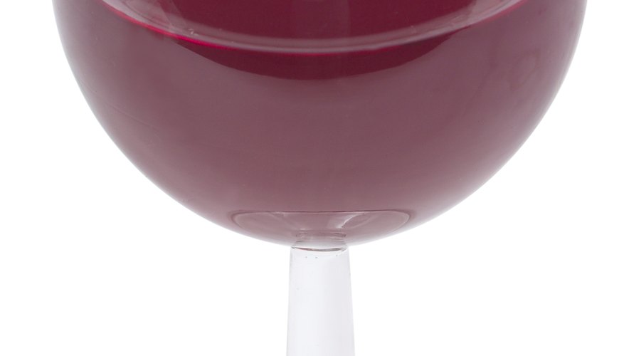 Photo Credit: Hemera Technologies/PhotoObjects.net/Getty Images The resonant frequency of a glass is lower when filled with liquid.