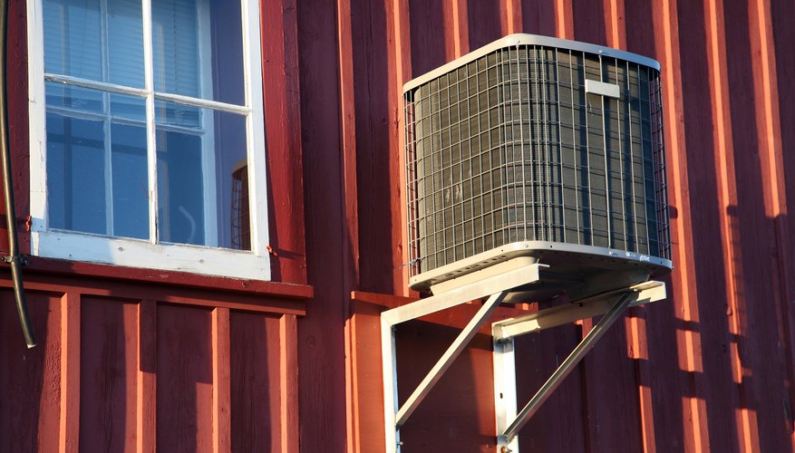 Photo Credit: Jupiterimages/Photos.com/Getty Images You can describe the efficiency of an air conditioner or heat pump like this one in terms of its HSPF.
