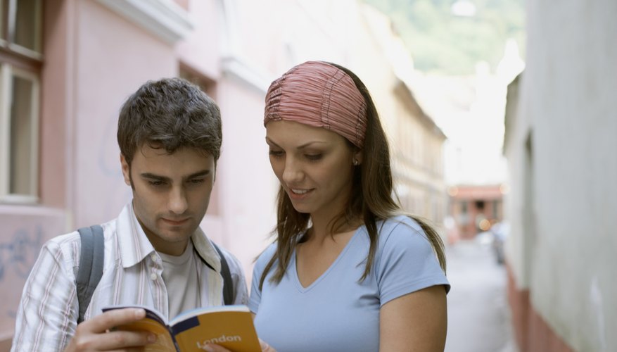 Couple reading tour guide