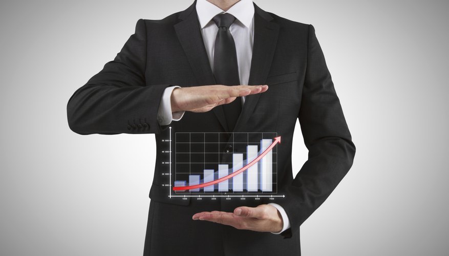 businessman shows chart