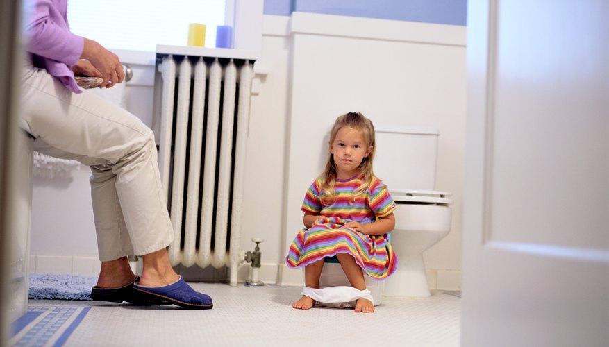 Dry, hard stools are a symptom of constipation in toddlers. Dry, hard stools are a symptom of constipation in toddlers.
