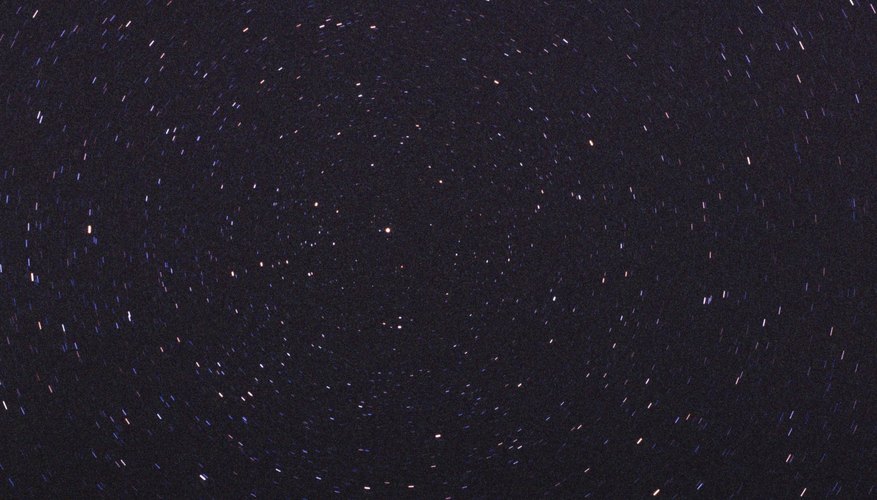 Photo Credit: Jupiterimages/Photos.com/Getty Images Constellations cover the night sky.