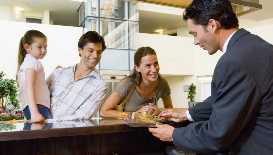 Family checking in at counter