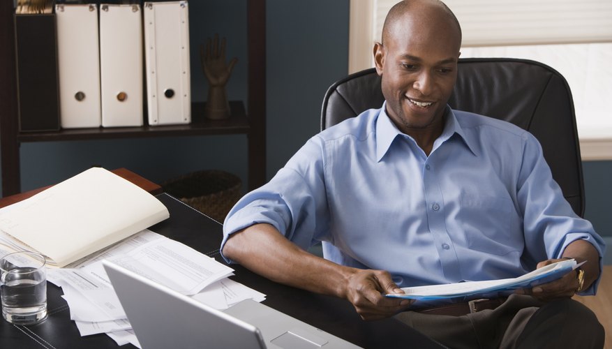 Businessman reading documents