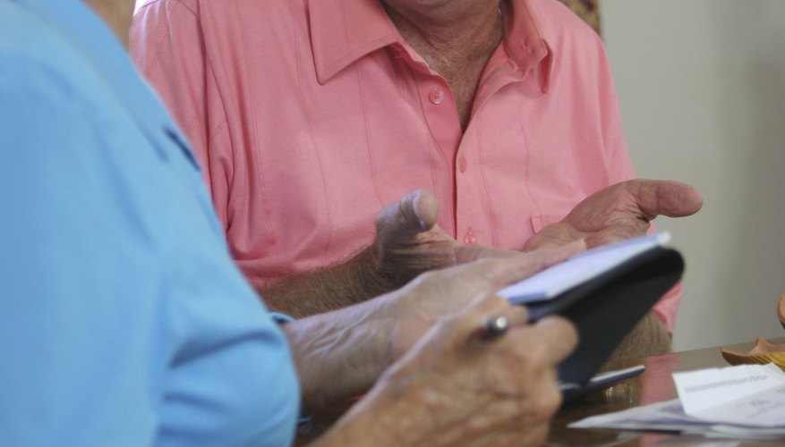 Close-up of a senior couple talking to each other