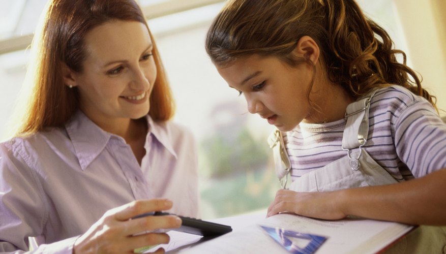Photo Credit: Purestock/Purestock/Getty Images Teacher explaining to young student.