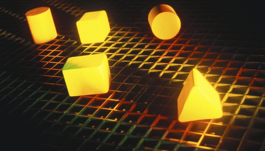 Photo Credit: Hemera Technologies/Photos.com/Getty Images The surface area of a prism is expressed in square units, while the volume is expressed in cubic units.