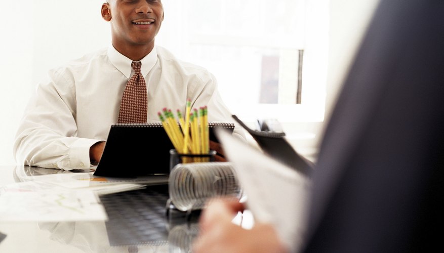 Photo Credit: Ablestock.com/AbleStock.com/Getty Images Job interview