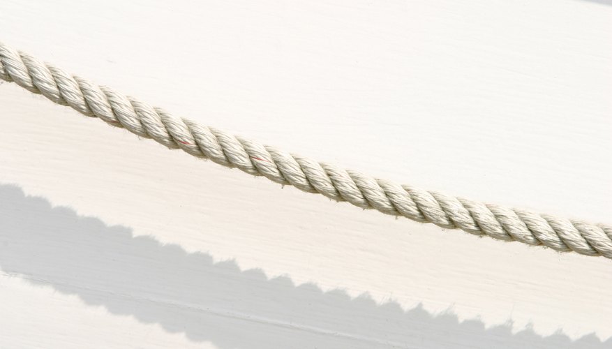 Photo Credit: Hemera Technologies/AbleStock.com/Getty Images The twists in a DNA molecule shrink the gaps between its components.