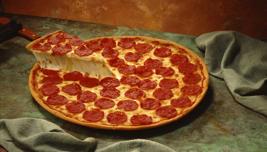 Photo Credit: Jupiterimages/Stockbyte/Getty Images One piece of pizza out of eight, expressed as 1/8, is equal to 0.125.