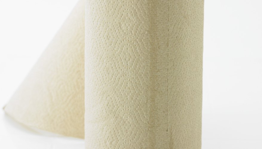 Absorbent paper towels help remove stain moisture. Absorbent paper towels help remove stain moisture.