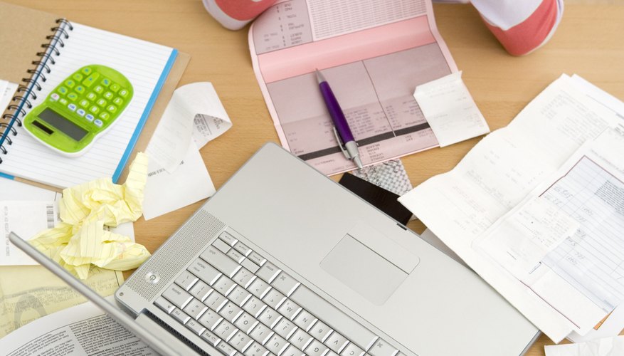 Search in files and stacks of paperwork for old receipts or invoices.