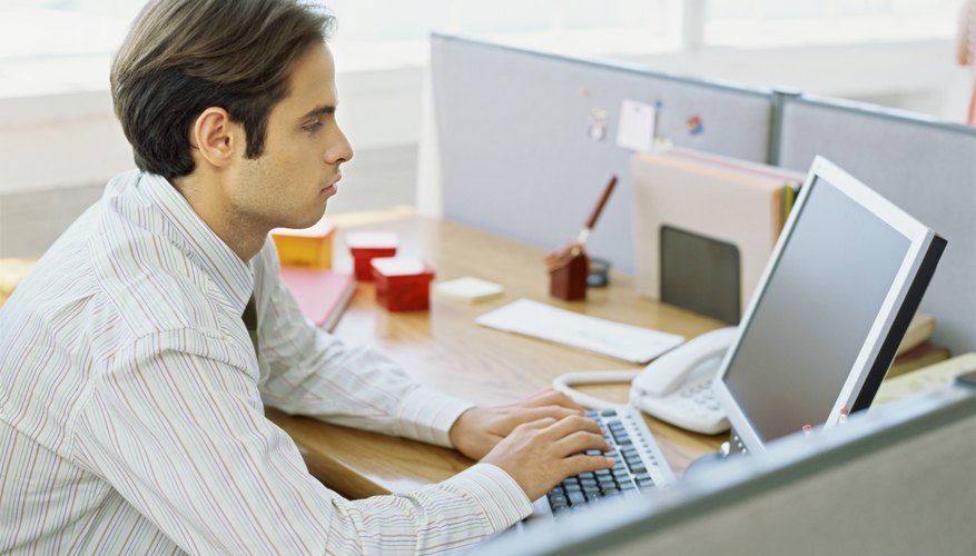 high angle view of a businessman using a computer in an office